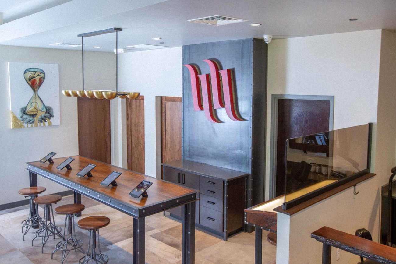 Check out our large H&amp;H 4 bar wall logo