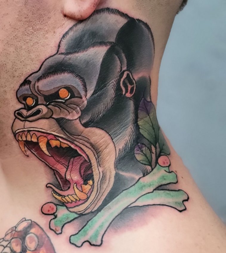 Grey Ink Fire Gorilla Head Tattoo On Sleeve